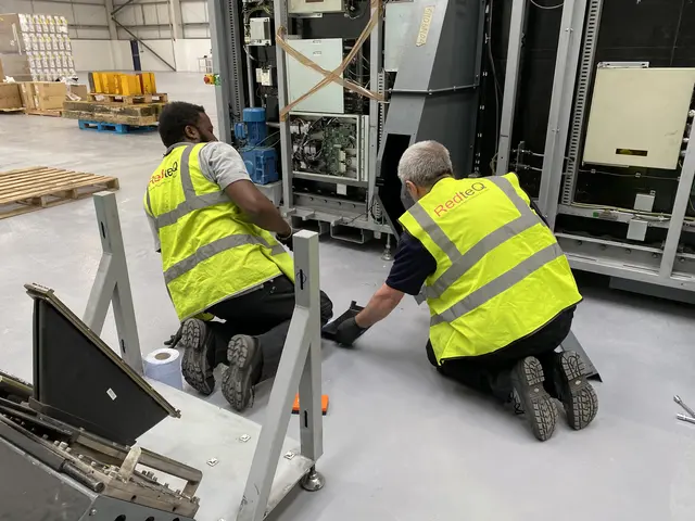 Two RedteQ engineers working together on a checkpoint installation