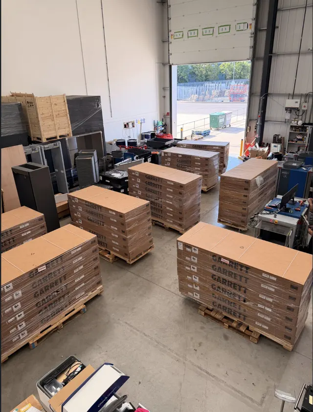 Pallets of Garrett Paragon walk-through metal detectors arriving at RedteQ