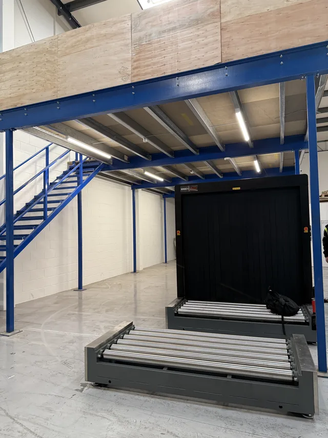 The first site's cargo X-ray part-built beneath a warehouse mezzanine