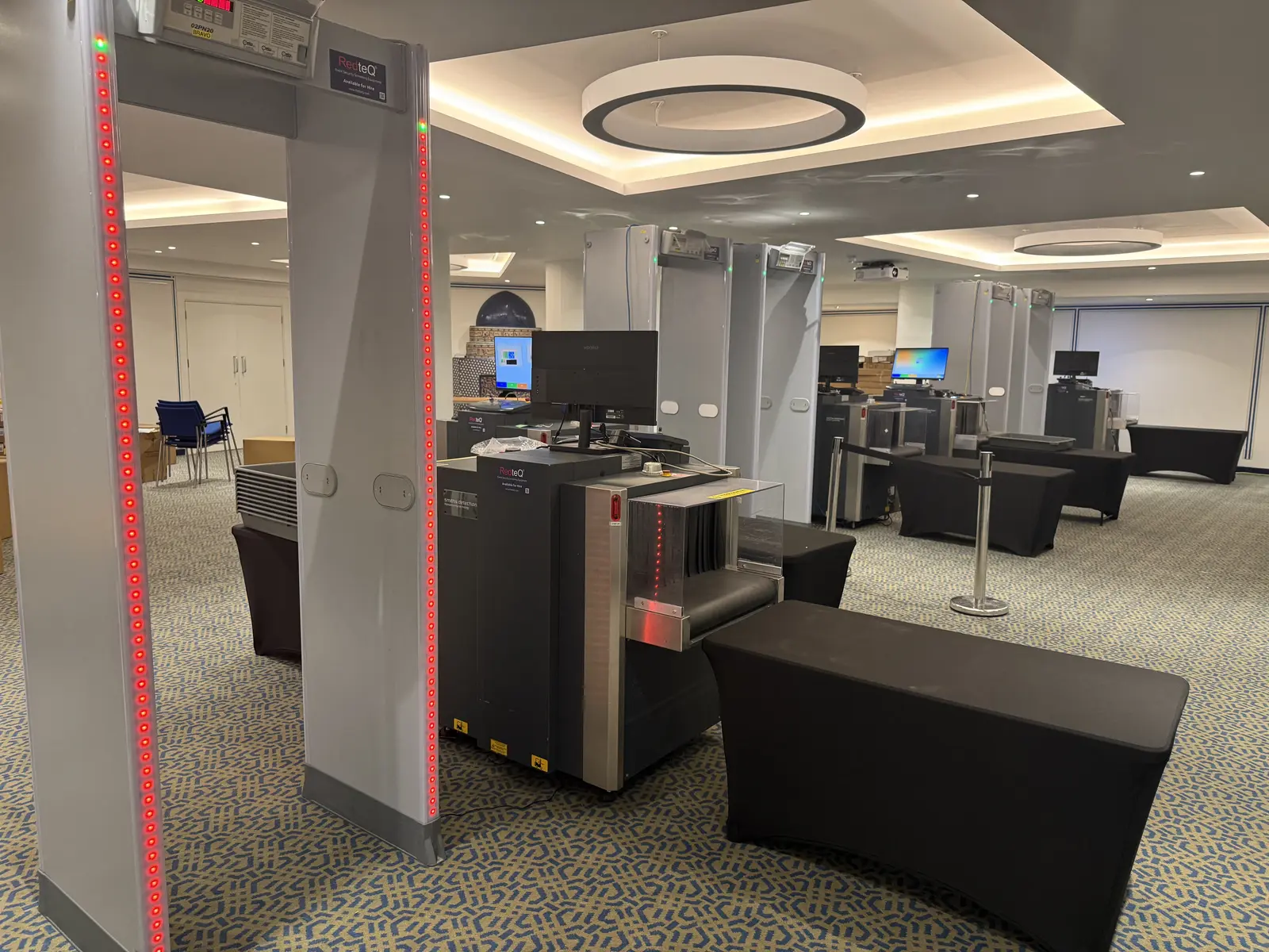 Multi-lane hired screening checkpoint built inside an event marquee