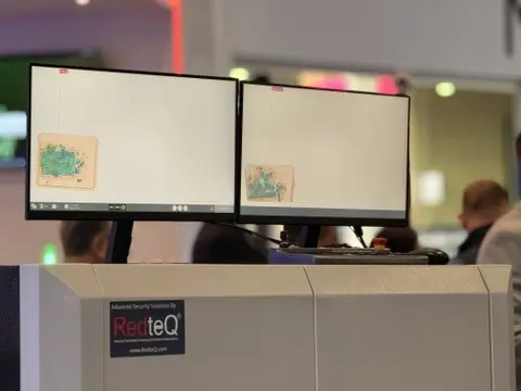 RedteQ exhibition stand with X-ray machine on display