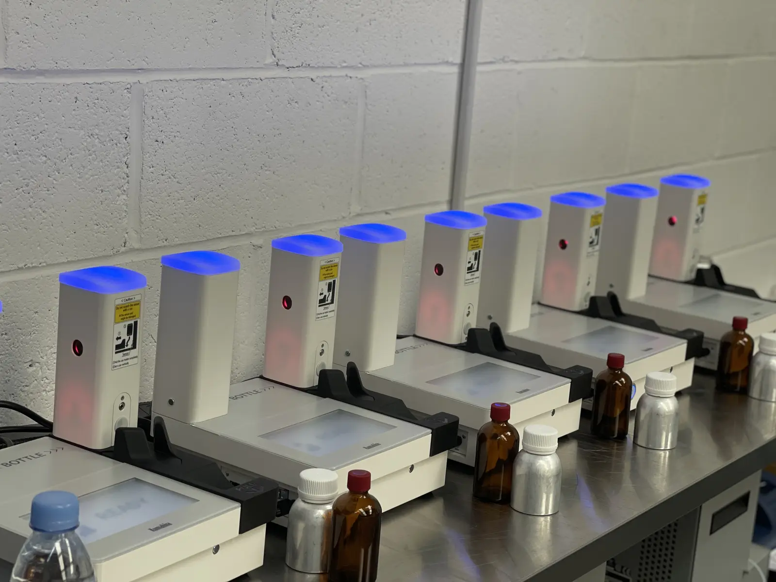 Row of Kumahira LSR-M2 liquid explosive detection systems supplied by RedteQ