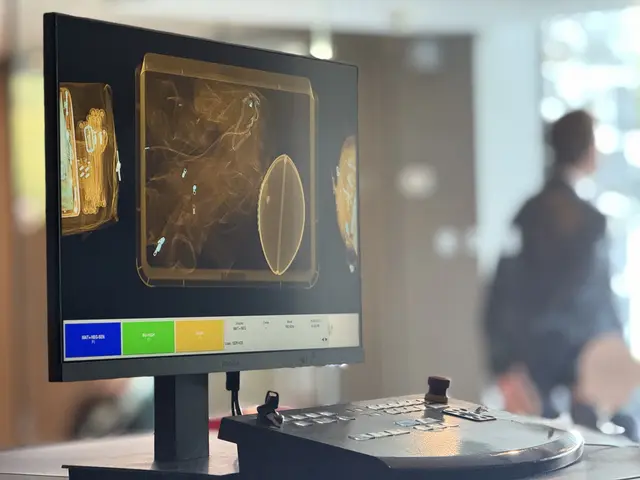 X-ray operator console and screen during screening