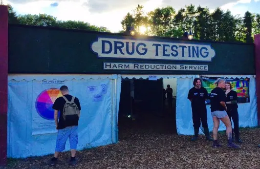 A festival drug testing and harm reduction service tent